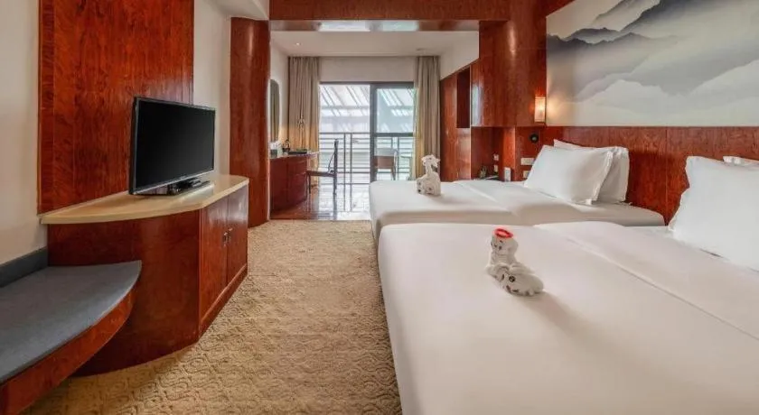 Bed in Expo Garden Hotel