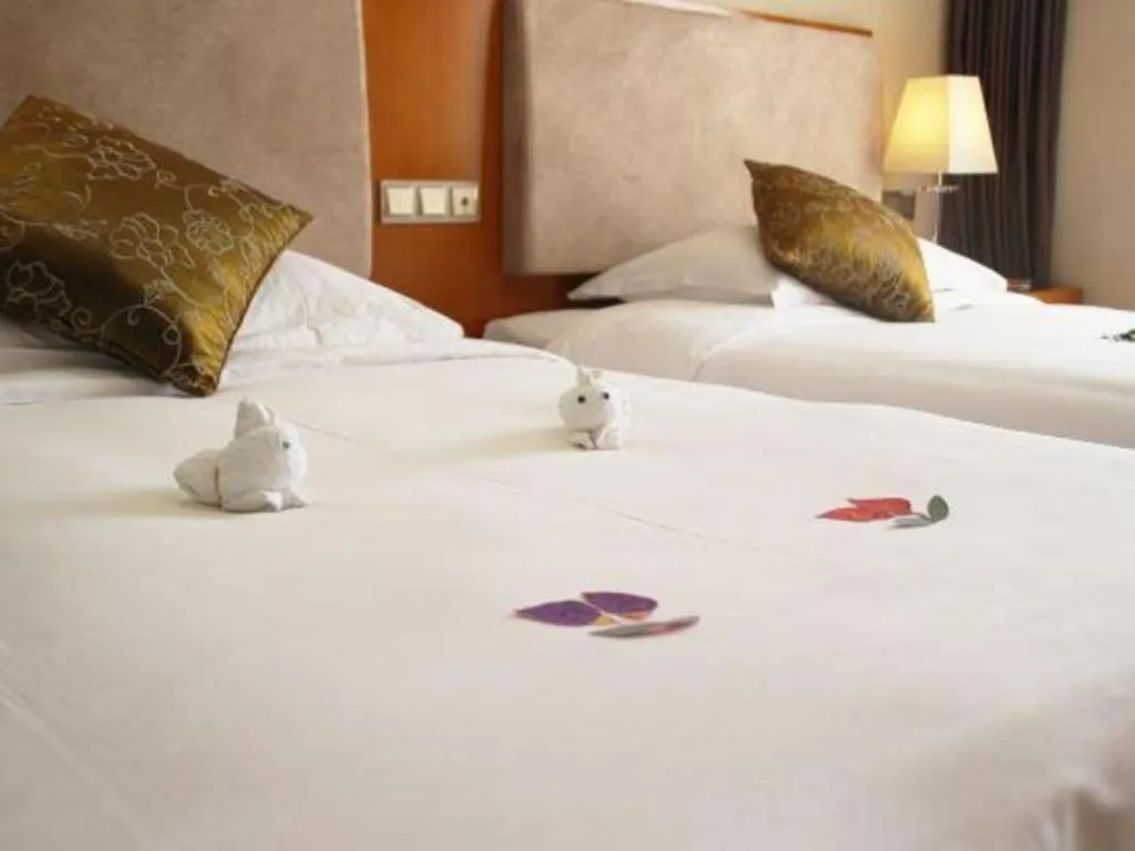 Bed in Expo Garden Hotel