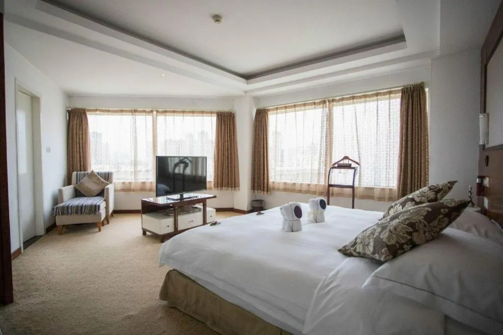 Bed in Expo Garden Hotel