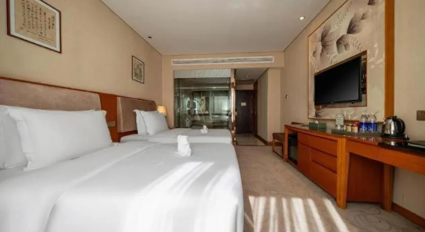 Bed in Expo Garden Hotel