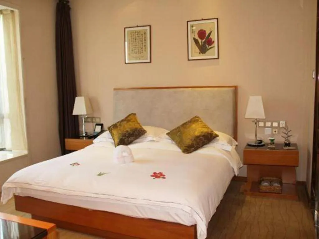 Bed in Expo Garden Hotel