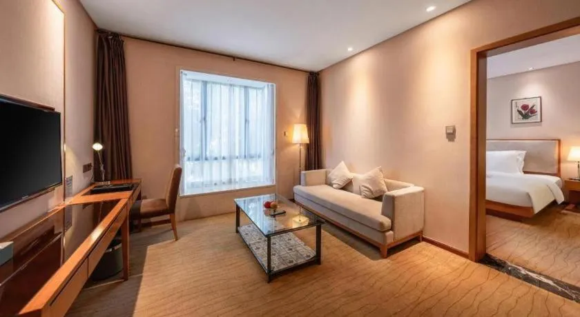 Bed in Expo Garden Hotel