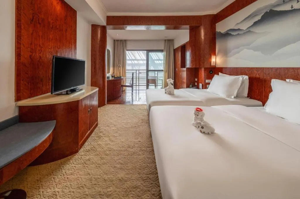 Bed in Expo Garden Hotel