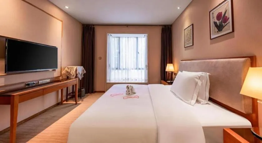 Bed in Expo Garden Hotel