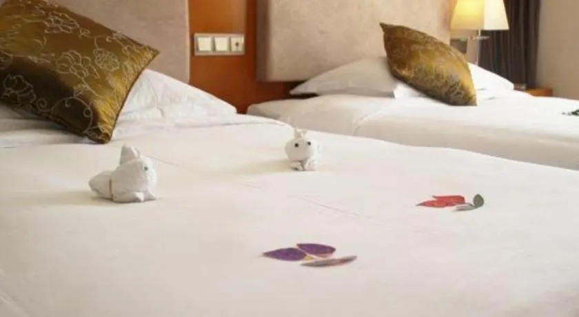 Bed in Expo Garden Hotel