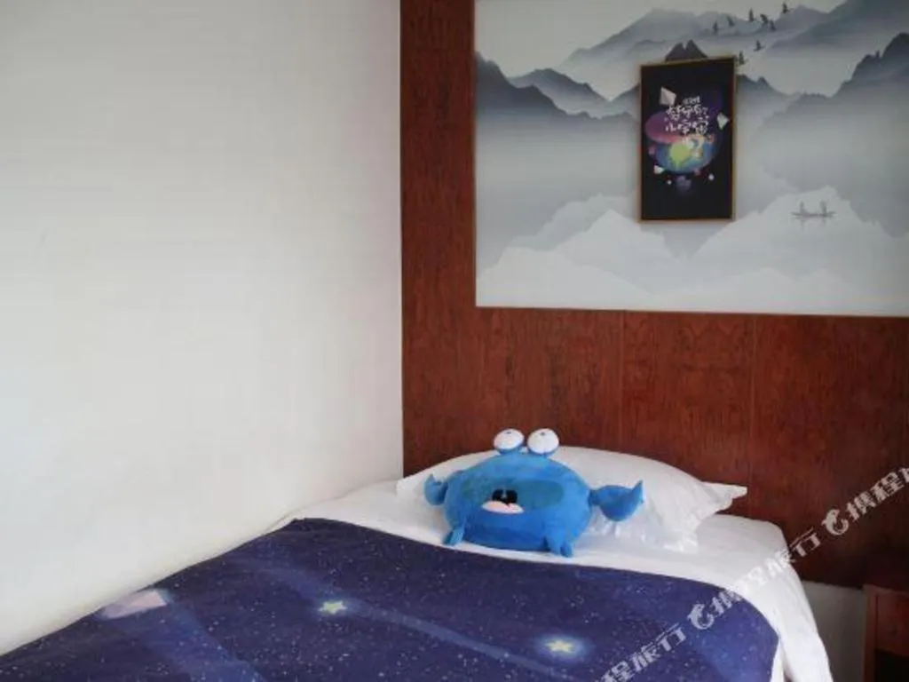 Bed in Expo Garden Hotel