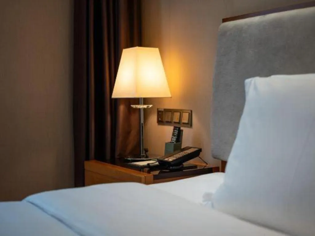 Bed in Expo Garden Hotel