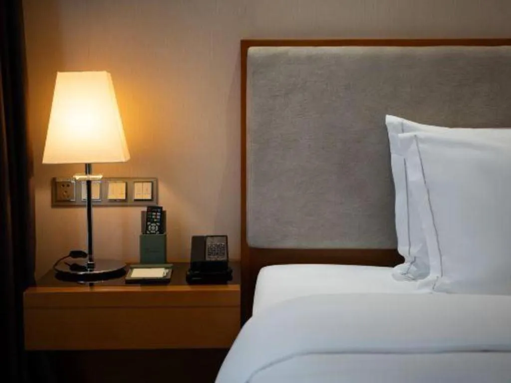 Bed in Expo Garden Hotel