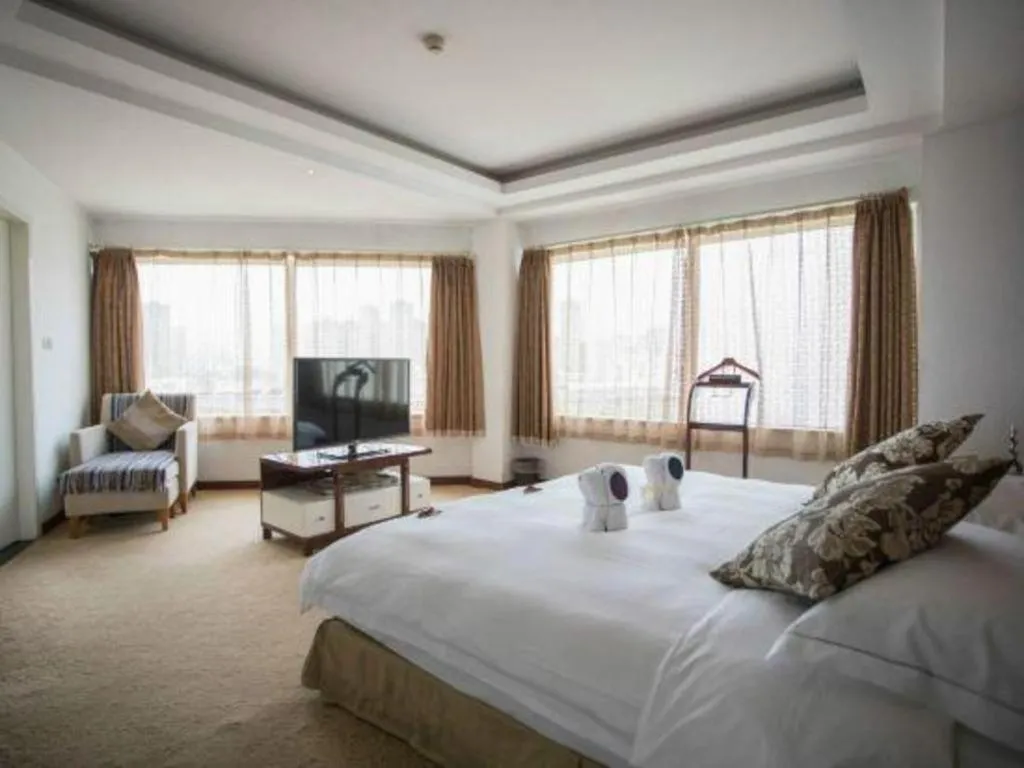 Bed in Expo Garden Hotel