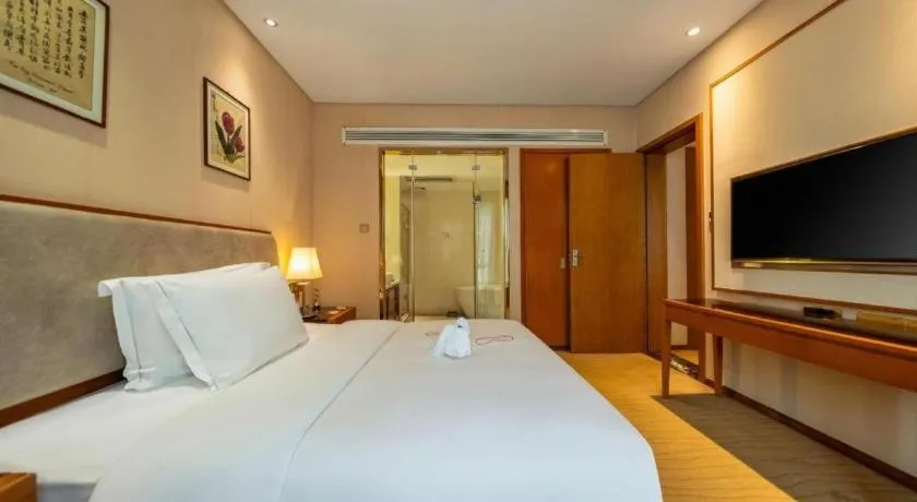 Bed in Expo Garden Hotel