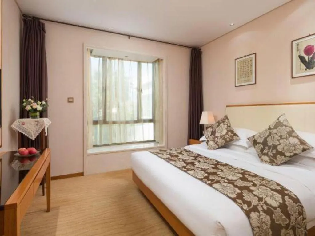 Bed in Expo Garden Hotel