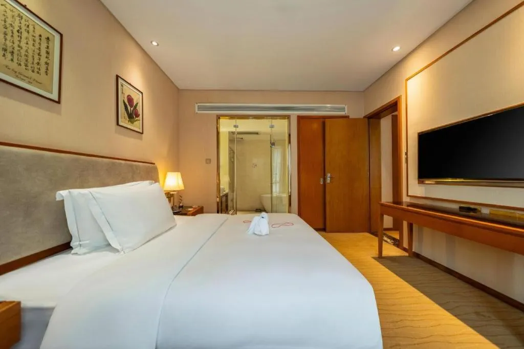 Bed in Expo Garden Hotel