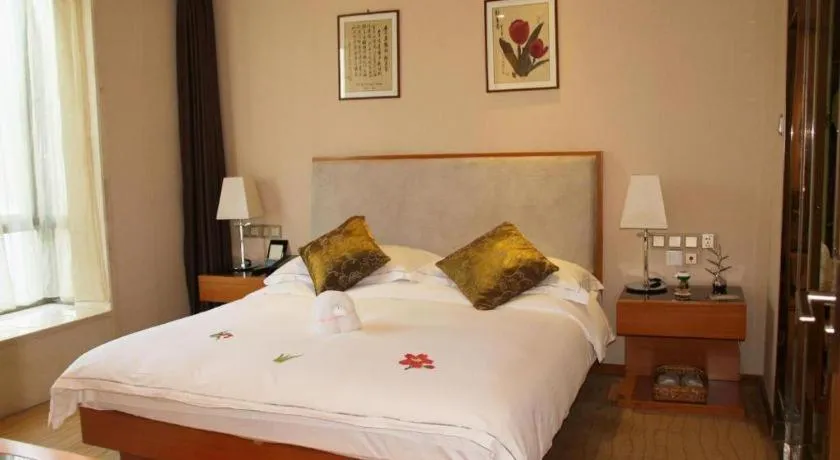 Bed in Expo Garden Hotel