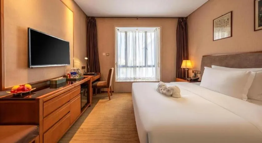 Bed in Expo Garden Hotel