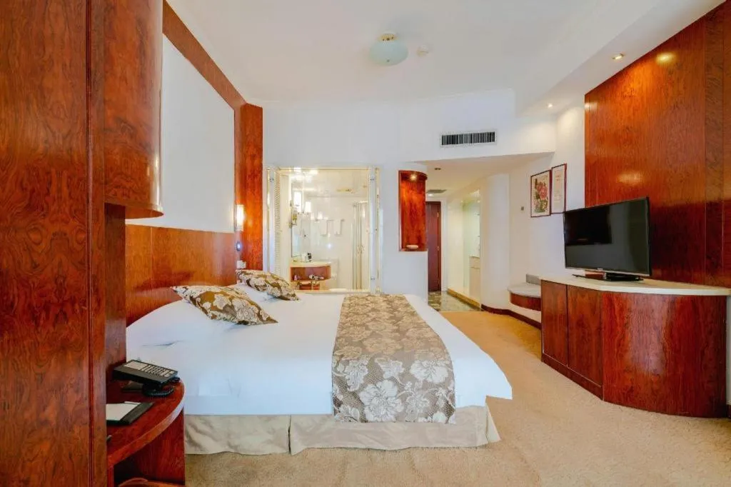 Bed in Expo Garden Hotel