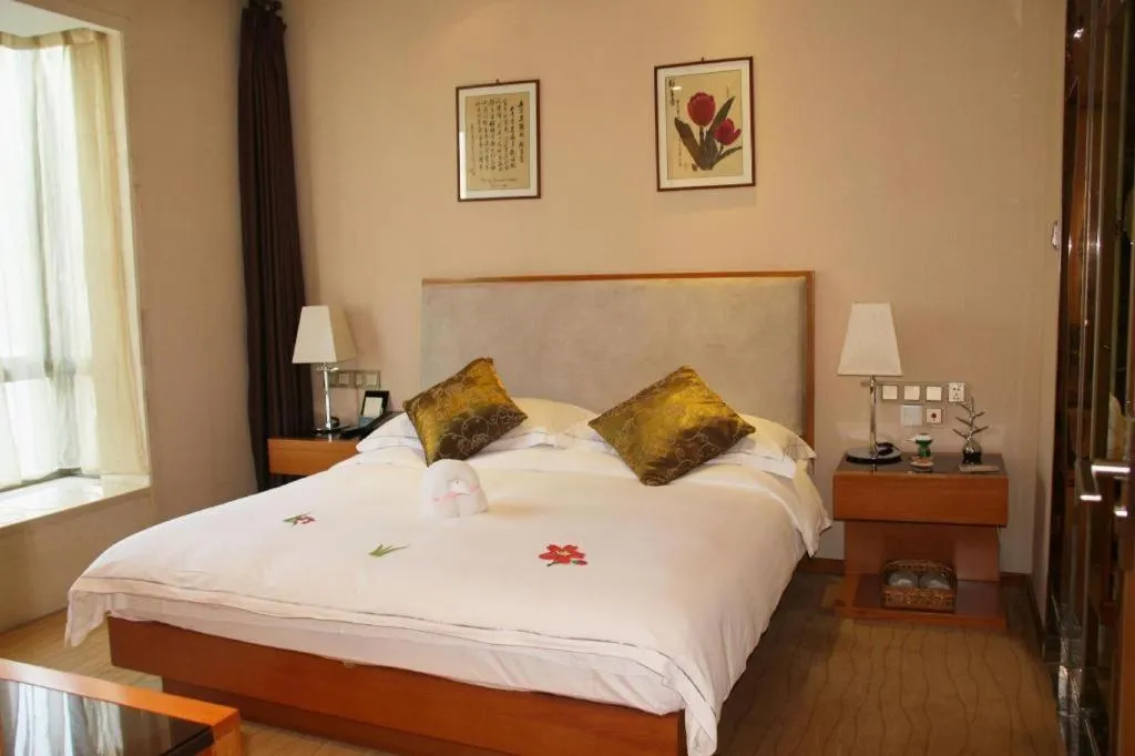 Bed in Expo Garden Hotel