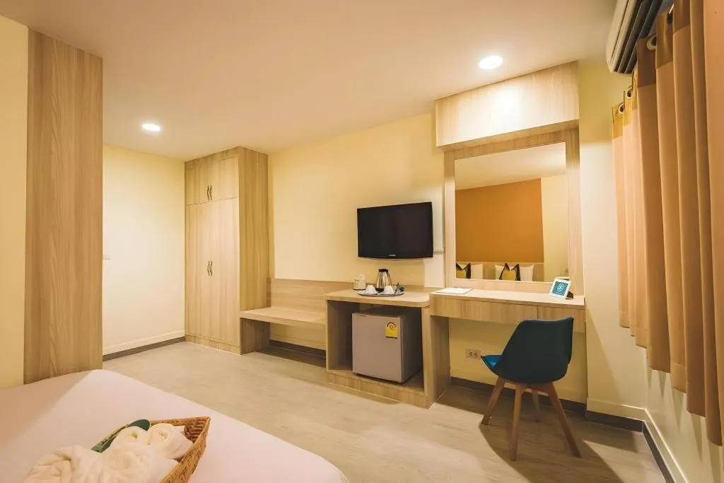 Bed in New Suanmali Hotel