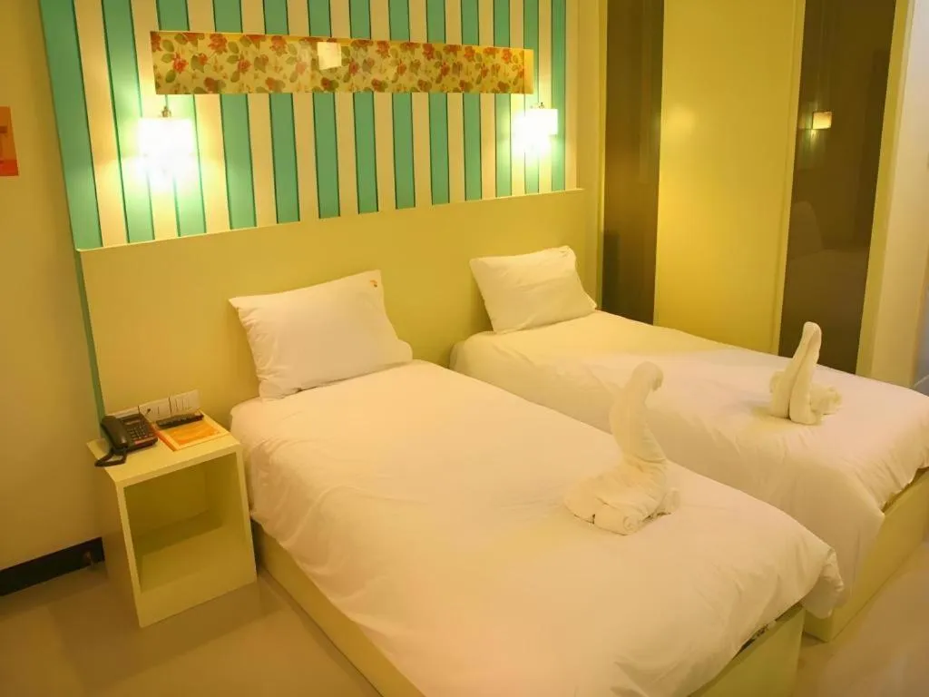 Bed in Ido Boutique Suite