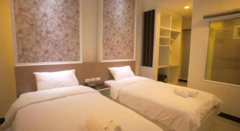 Bed in Ido Boutique Suite