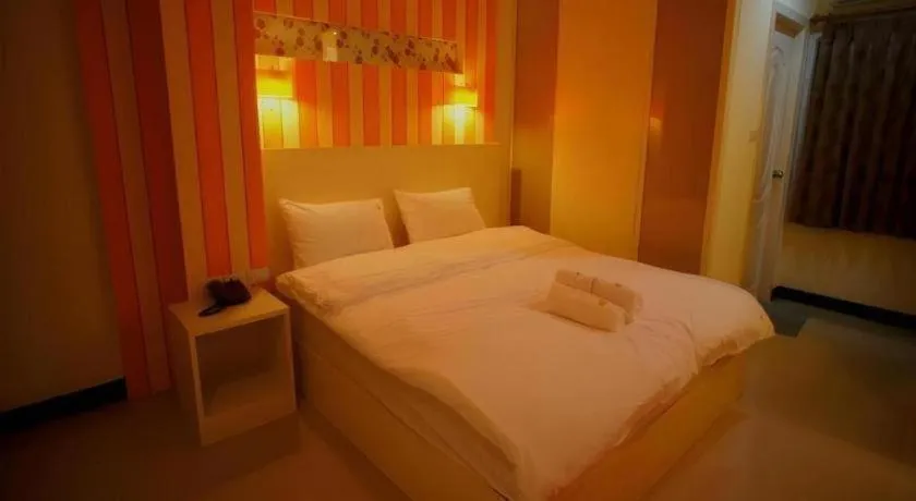 Bed in Ido Boutique Suite