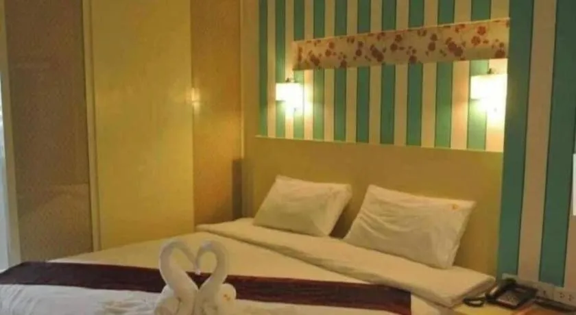 Bed in Ido Boutique Suite