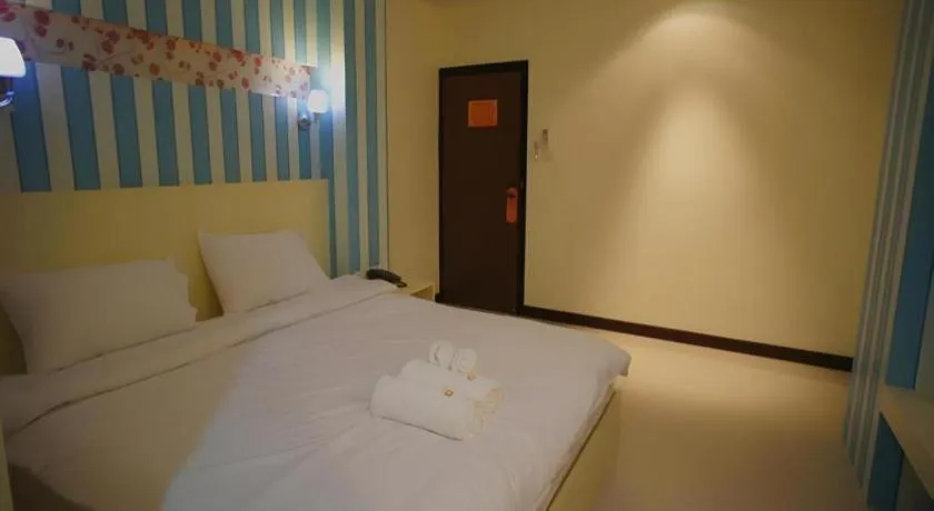 Bed in Ido Boutique Suite