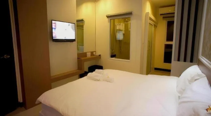 Bed in Ido Boutique Suite