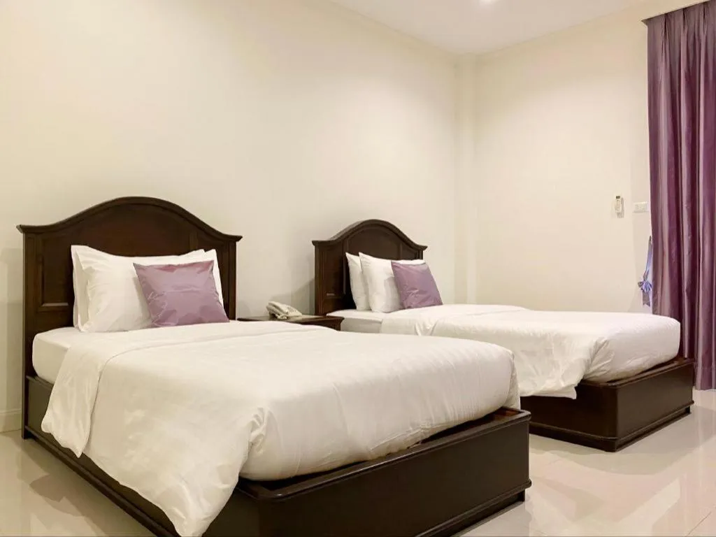 Bed in Ruen Maihom Riverside Cottage