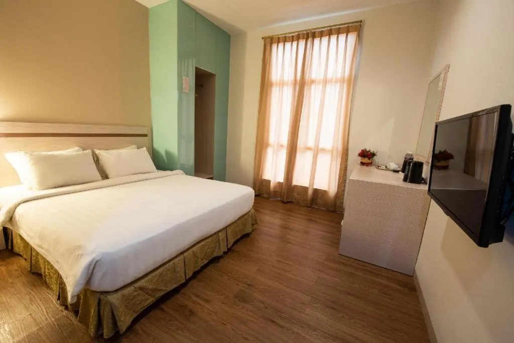 Bed in Lovina Inn Penuin Hotel