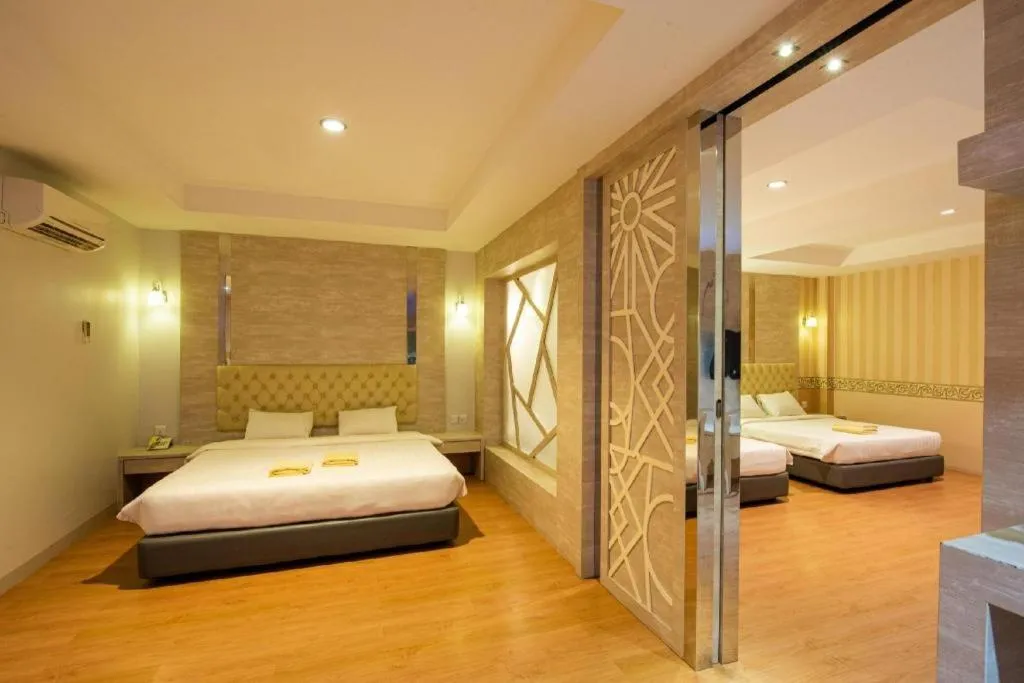 Bed in Lovina Inn Penuin Hotel