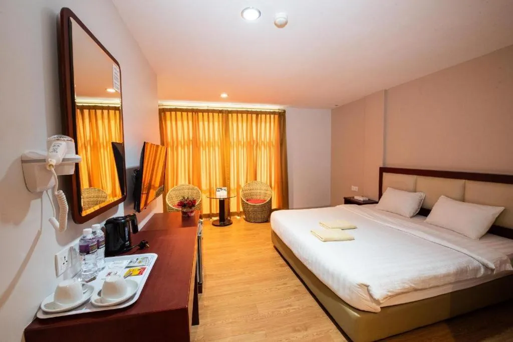 Bed in Lovina Inn Penuin Hotel