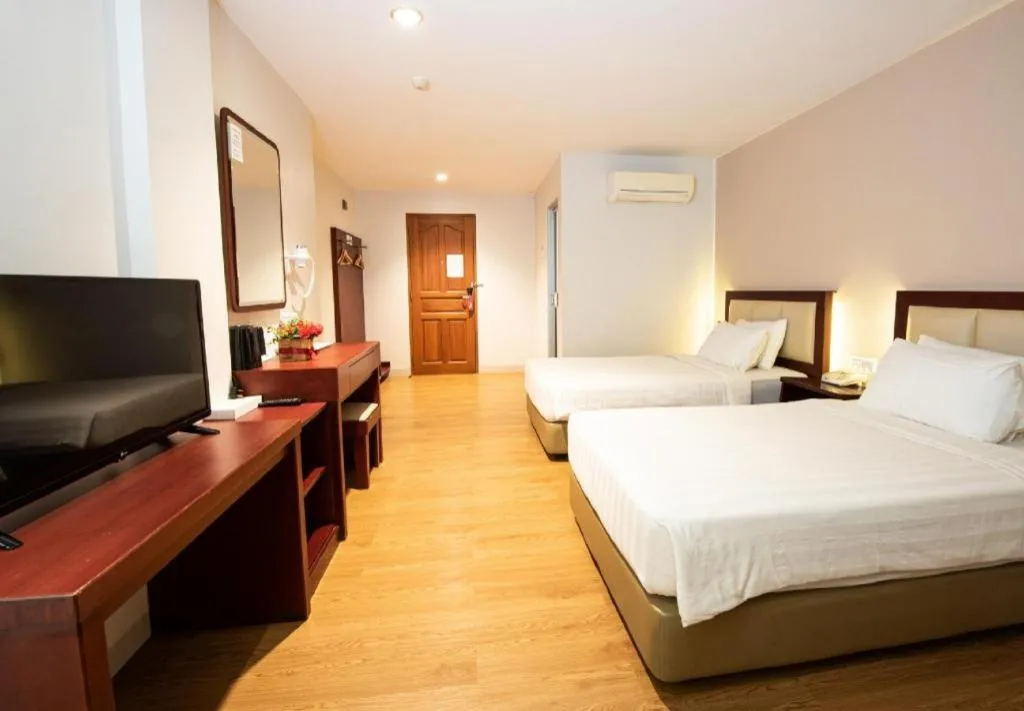 Bed in Lovina Inn Penuin Hotel