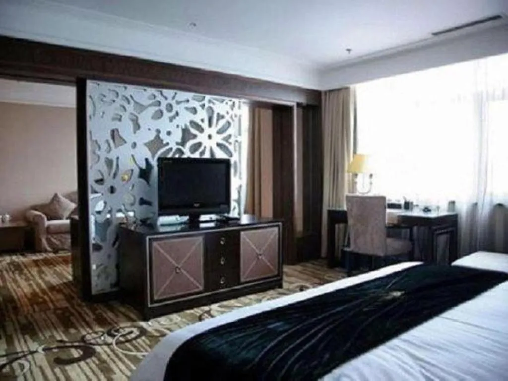 Bed in Qingdao Danube International Hotel