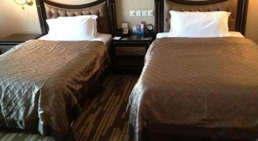 Bed in Qingdao Danube International Hotel