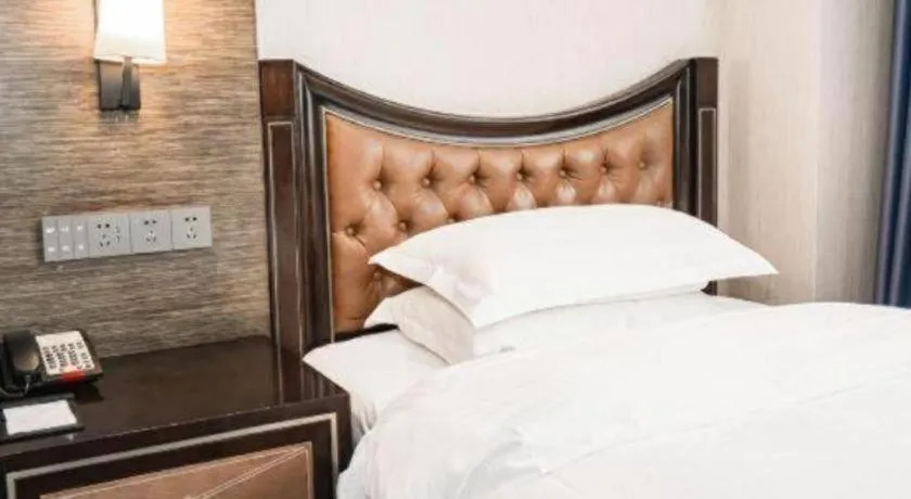 Bed in Qingdao Danube International Hotel