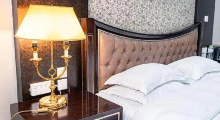 Bed in Qingdao Danube International Hotel