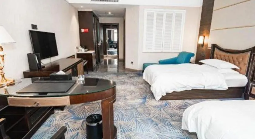 Bed in Qingdao Danube International Hotel