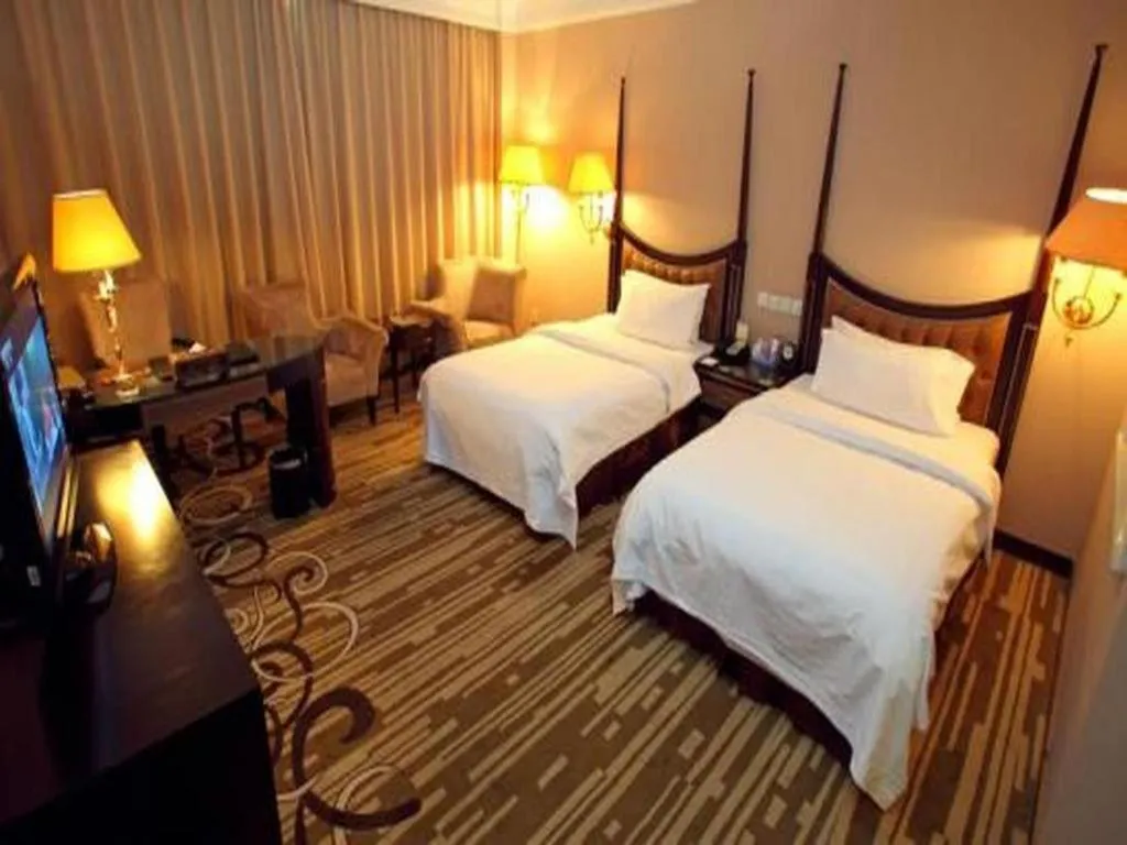 Bed in Qingdao Danube International Hotel