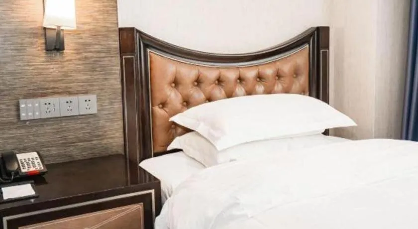 Bed in Qingdao Danube International Hotel