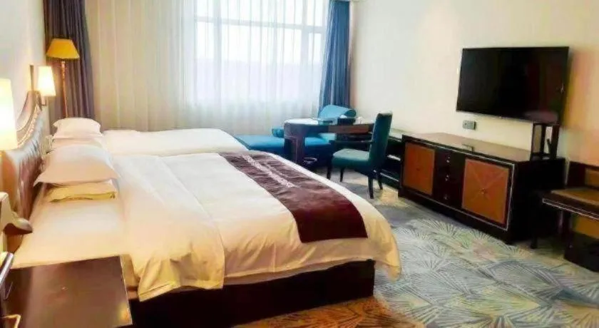 Bed in Qingdao Danube International Hotel