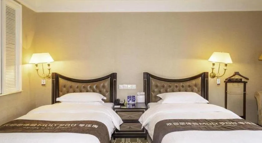 Bed in Qingdao Danube International Hotel