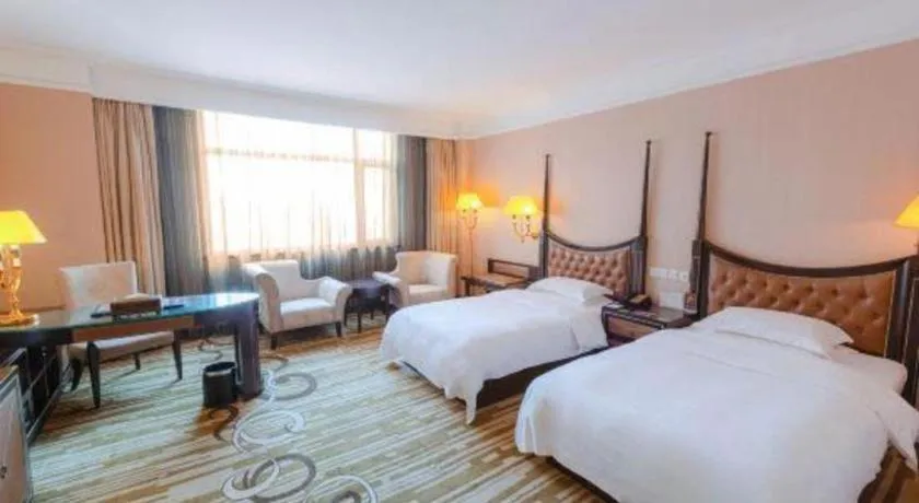 Bed in Qingdao Danube International Hotel