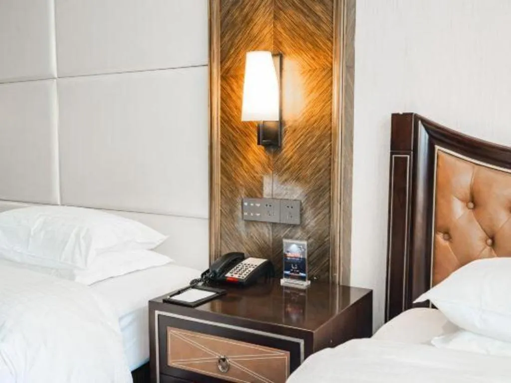 Bed in Qingdao Danube International Hotel