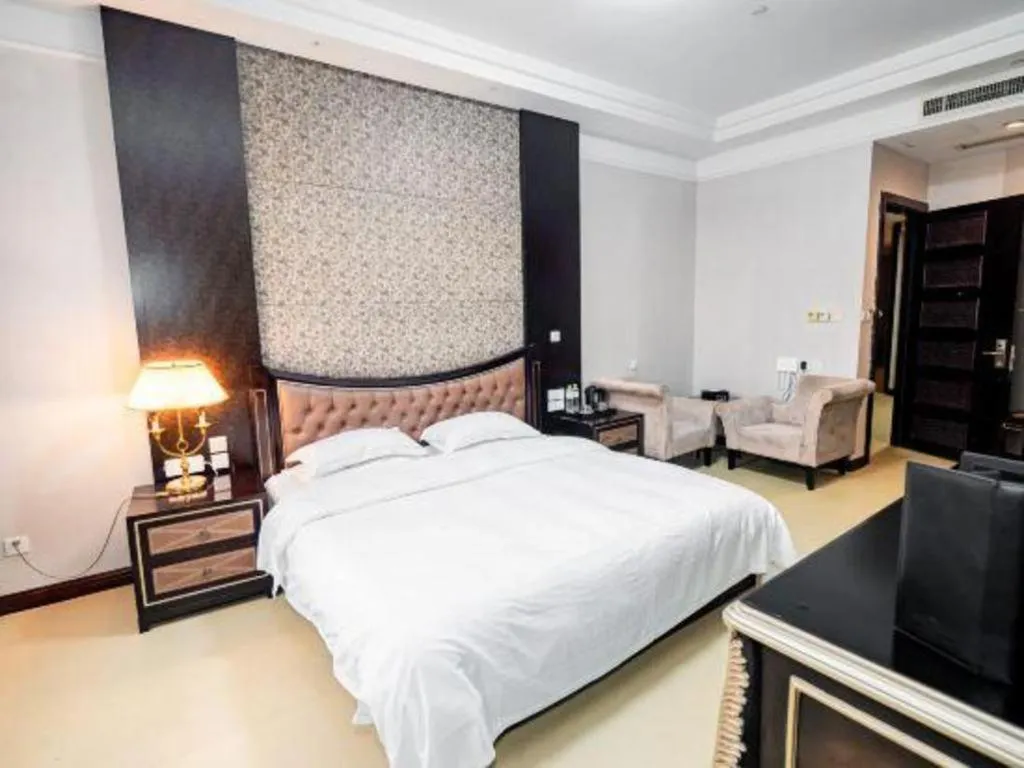 Bed in Qingdao Danube International Hotel