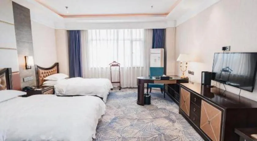 Bed in Qingdao Danube International Hotel