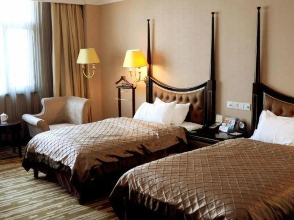 Bed in Qingdao Danube International Hotel