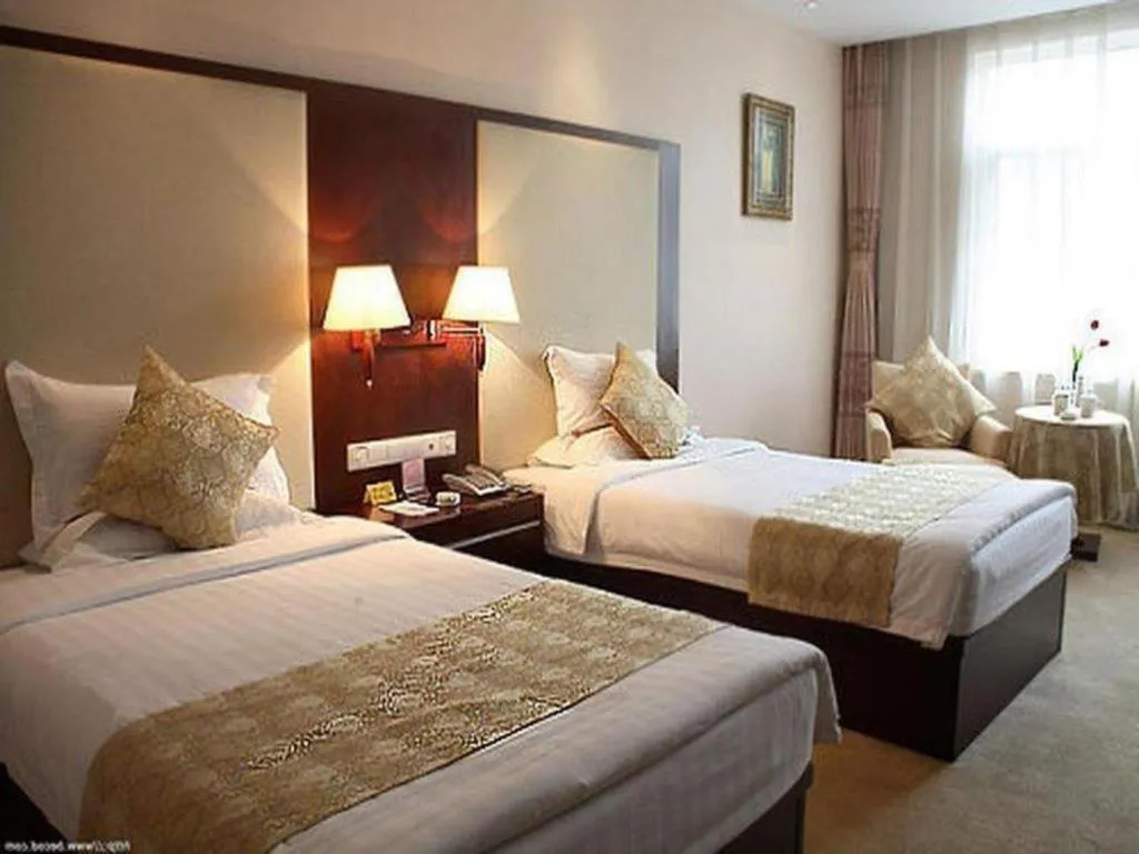 Bed in Qingdao Danube International Hotel