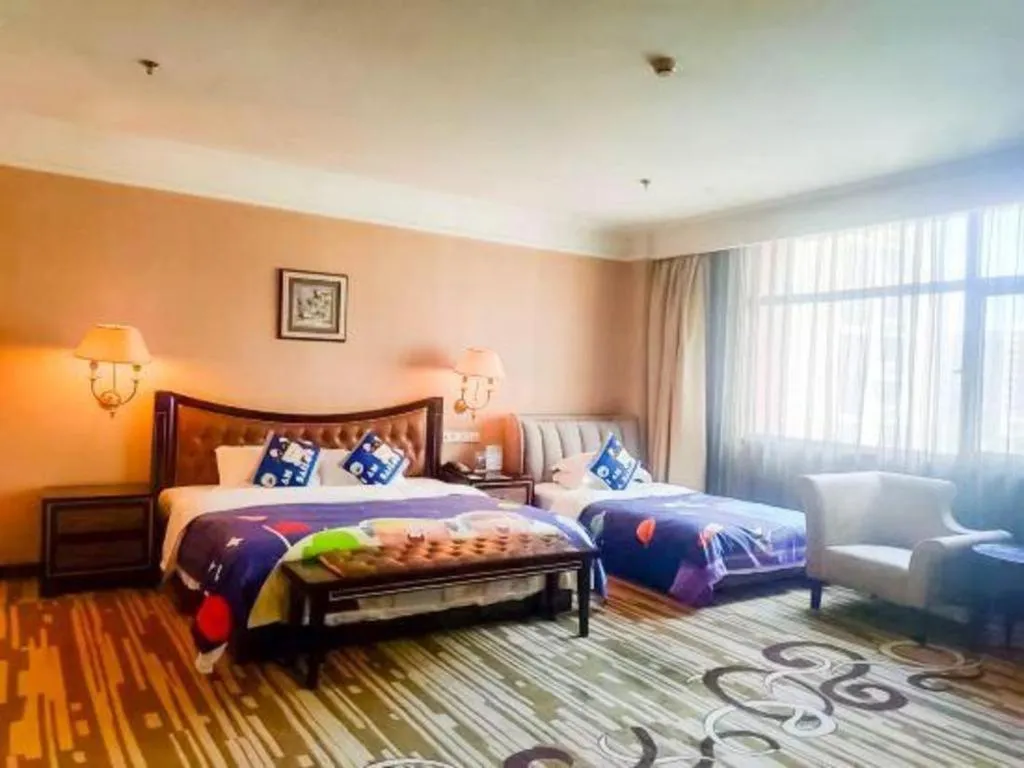 Bed in Qingdao Danube International Hotel