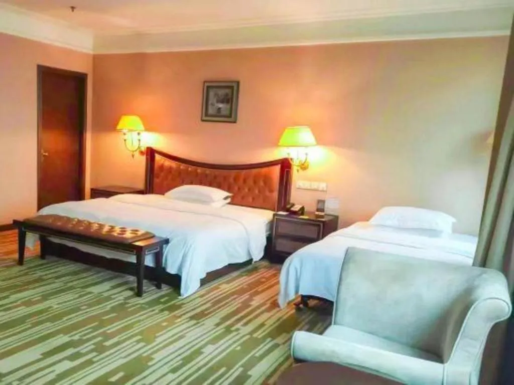 Bed in Qingdao Danube International Hotel