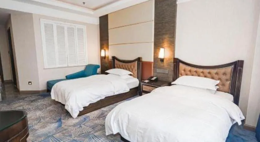 Bed in Qingdao Danube International Hotel